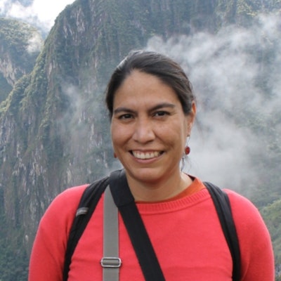 Farah Carrasco in front of mountains