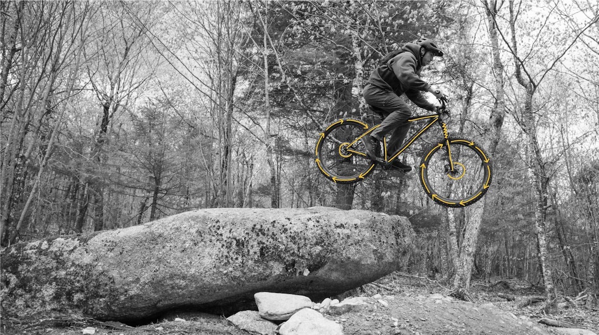 Person riding with mountain bike
