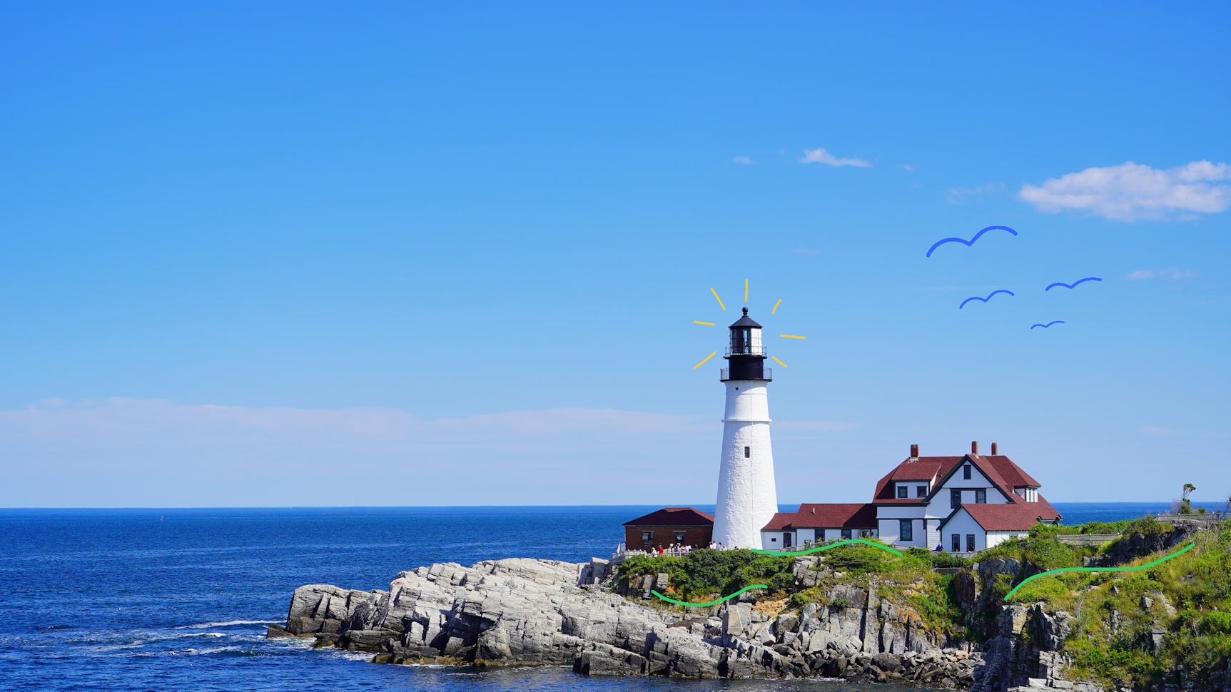 an image of portland head light, a lighthouse on a cliff overlooking the ocean