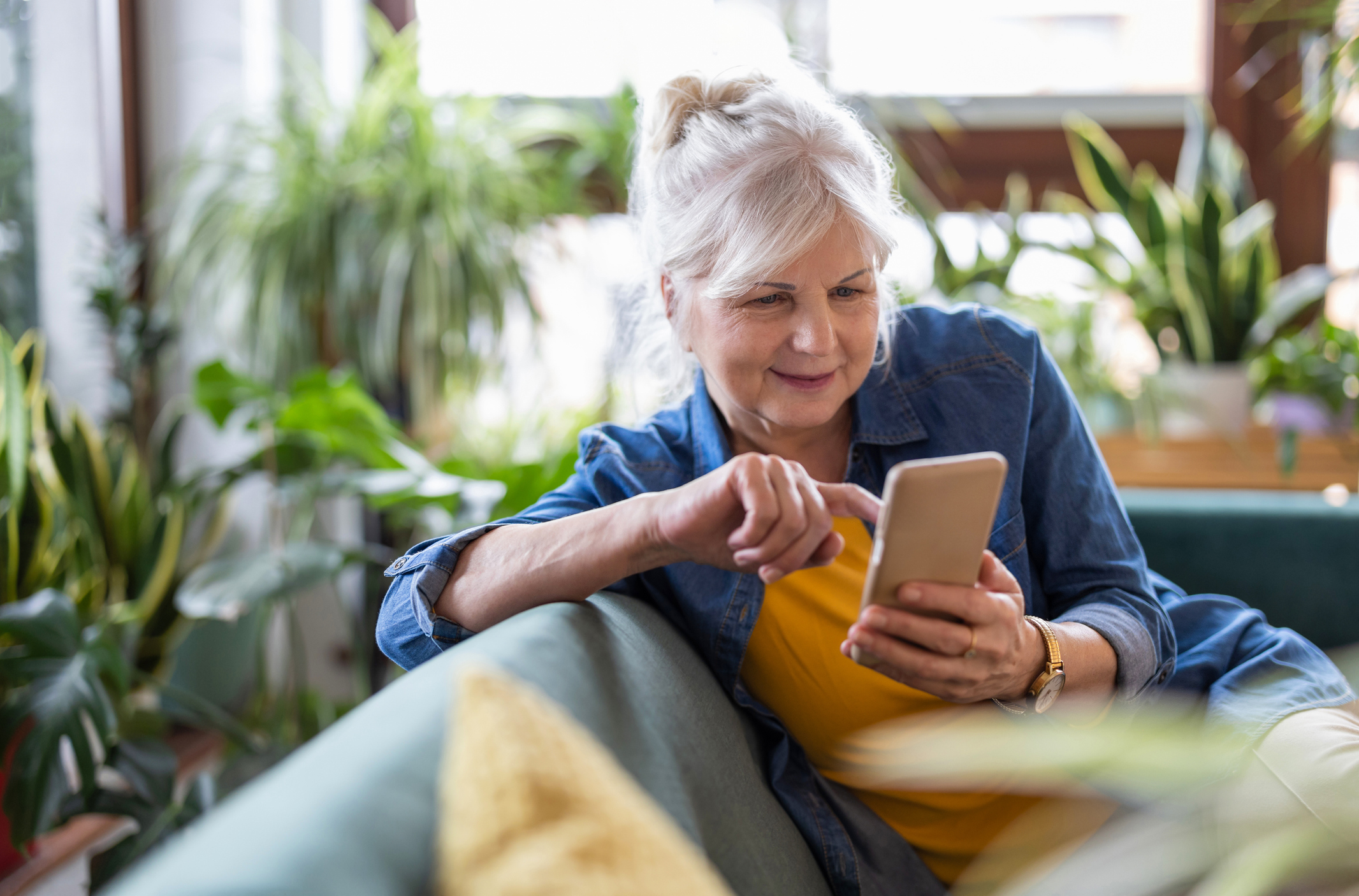Elderly woman with phone