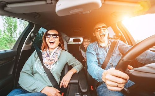 Couple driving a car