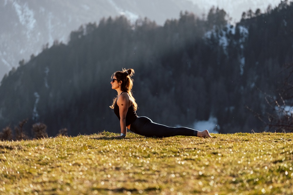 "The Upward Facing Dog pose strengthens the whole posterior chain (back body), especially the arms and back."