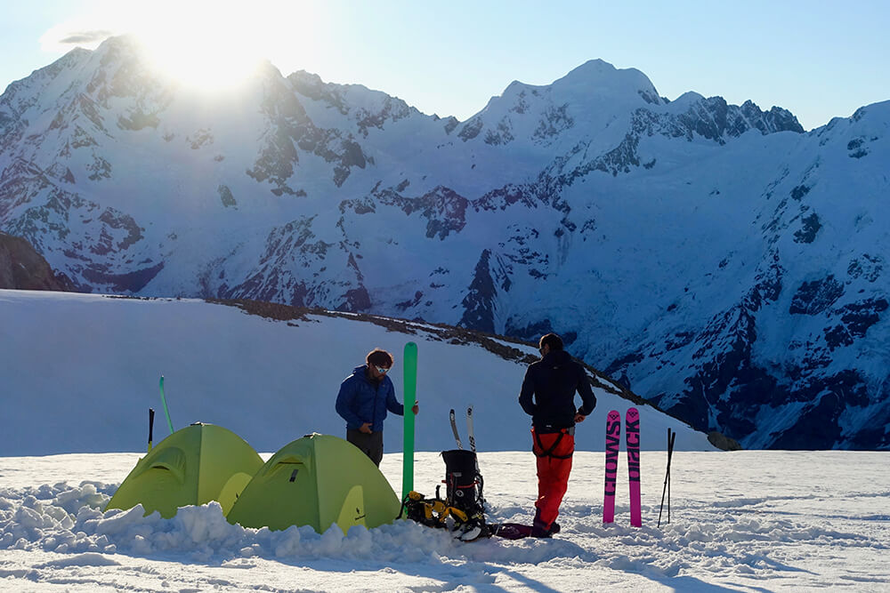 Camp: At the foot of Malte Brun shortly after making the first descent of its south face with Aoraki/Cook in the background. Photo: Tom Grant