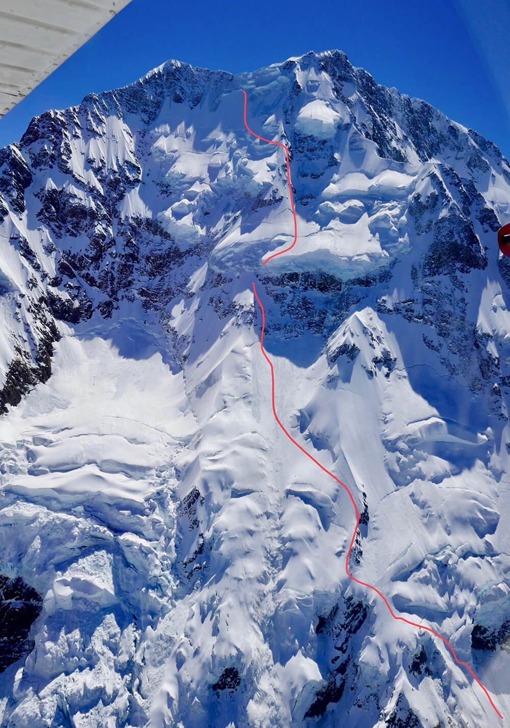The carefully planned descent down the Caroline Face. Glacial and snow conditions are essential to make this challenge viable. Photo: Ben Briggs