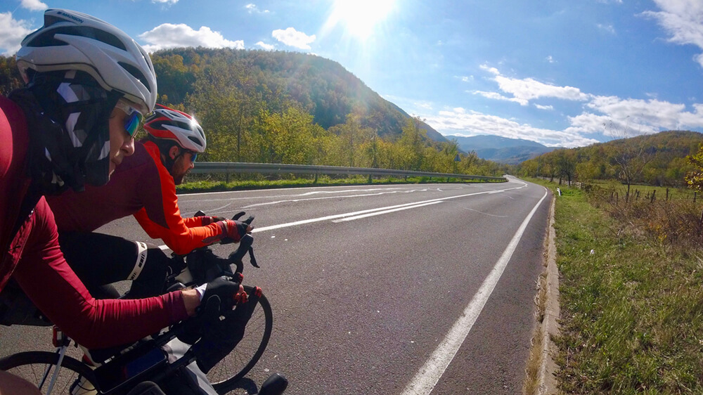 Beautiful open roads through rolling countryside during a bright but chilly day