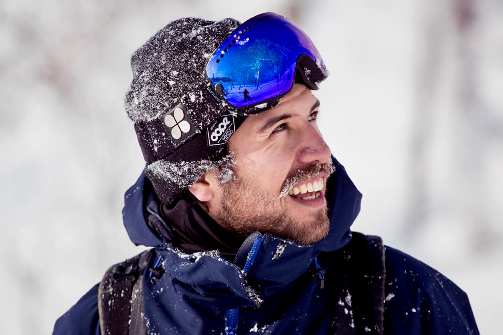 Victor embraces the moment after an epic treeline just outside Niseko. Photo: Simon Rainer