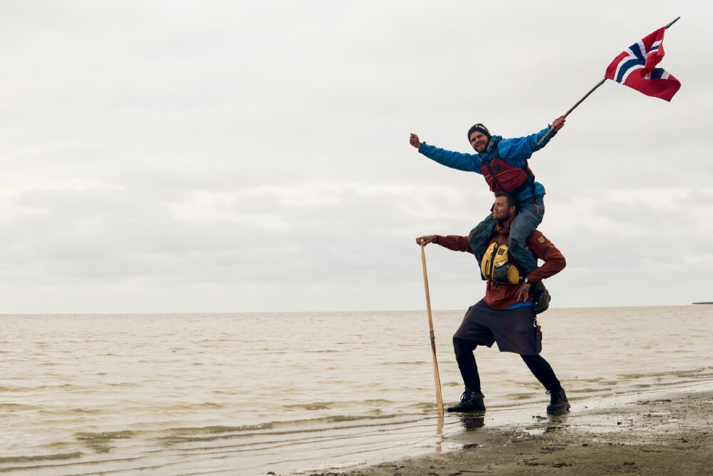 Marius and Ivan celebrate in style at the mouth of the Yukon as the river flows into the Bering Sea. Mission accomplished!