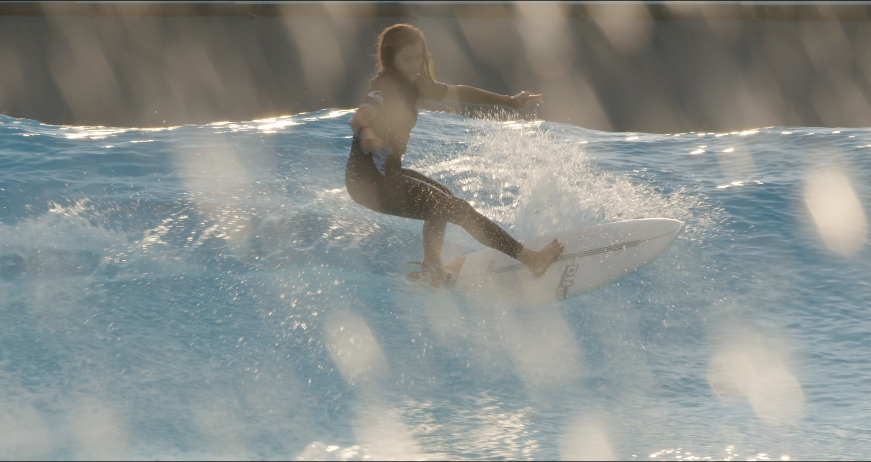 Ari Tricomi surfing
