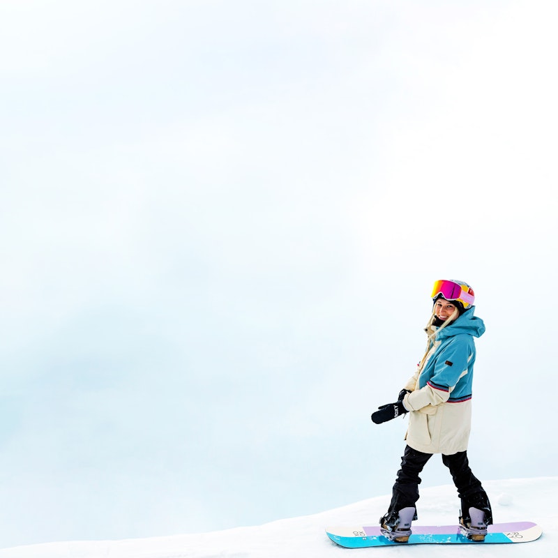 Katie Ormerod snowboarding in SunGod vanguards goggles