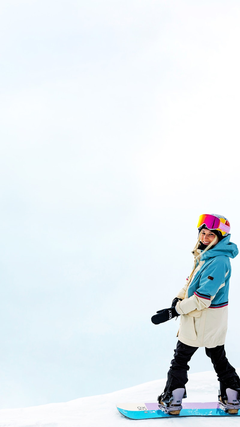 Katie Ormerod snowboarding in SunGod vanguards goggles