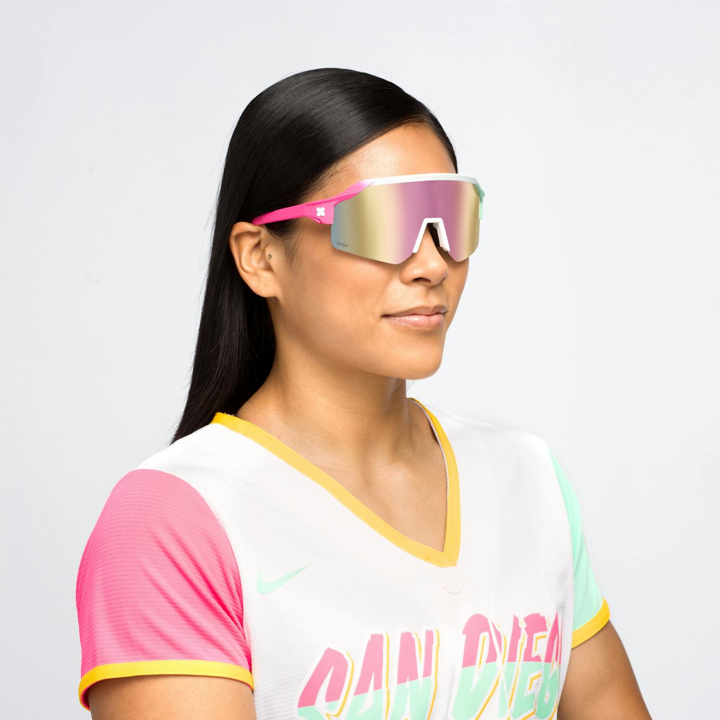 Female model wearing San Diego Padres City Connect Vulcans Sunglasses