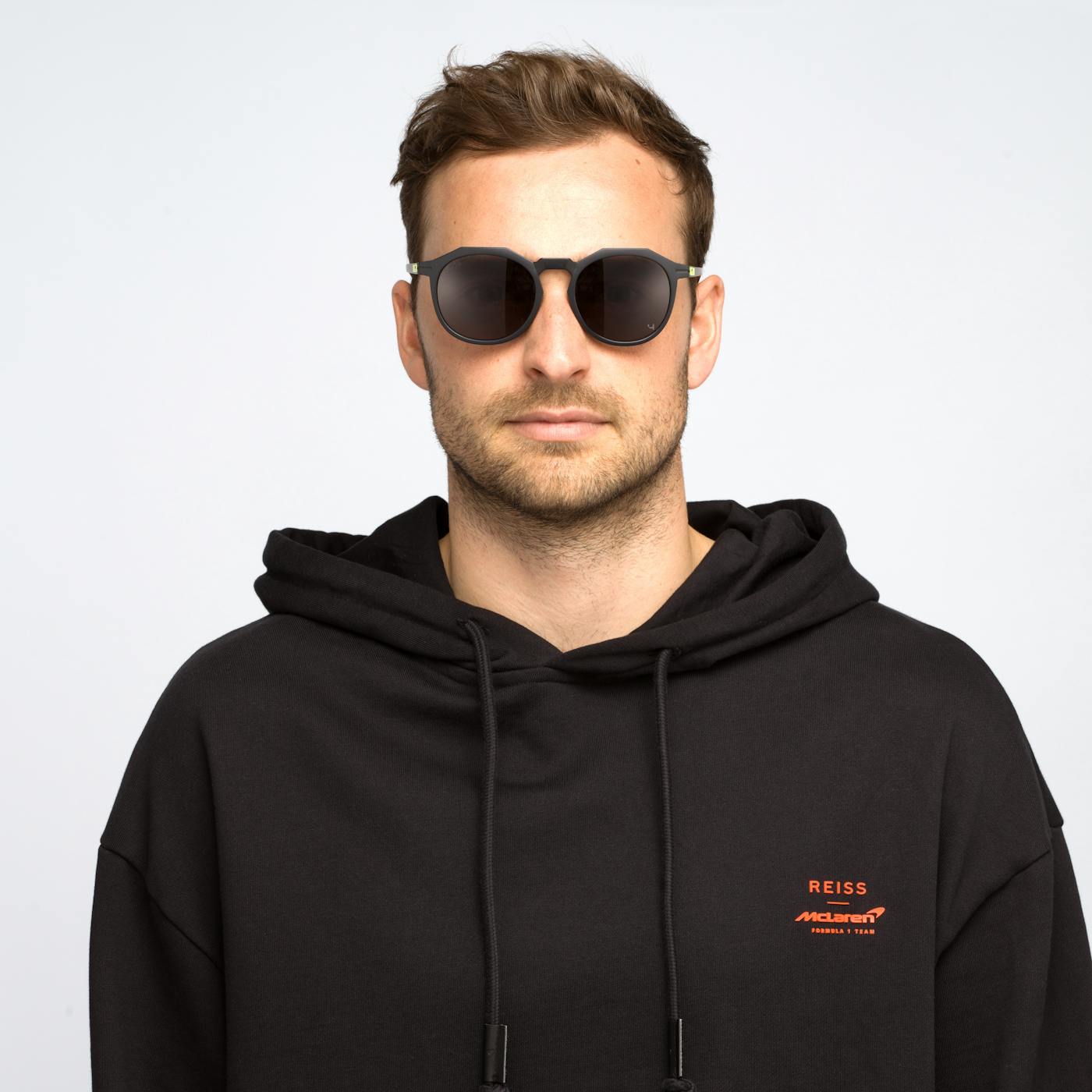 Male model wearing SunGod Zephyrs Sunglasses