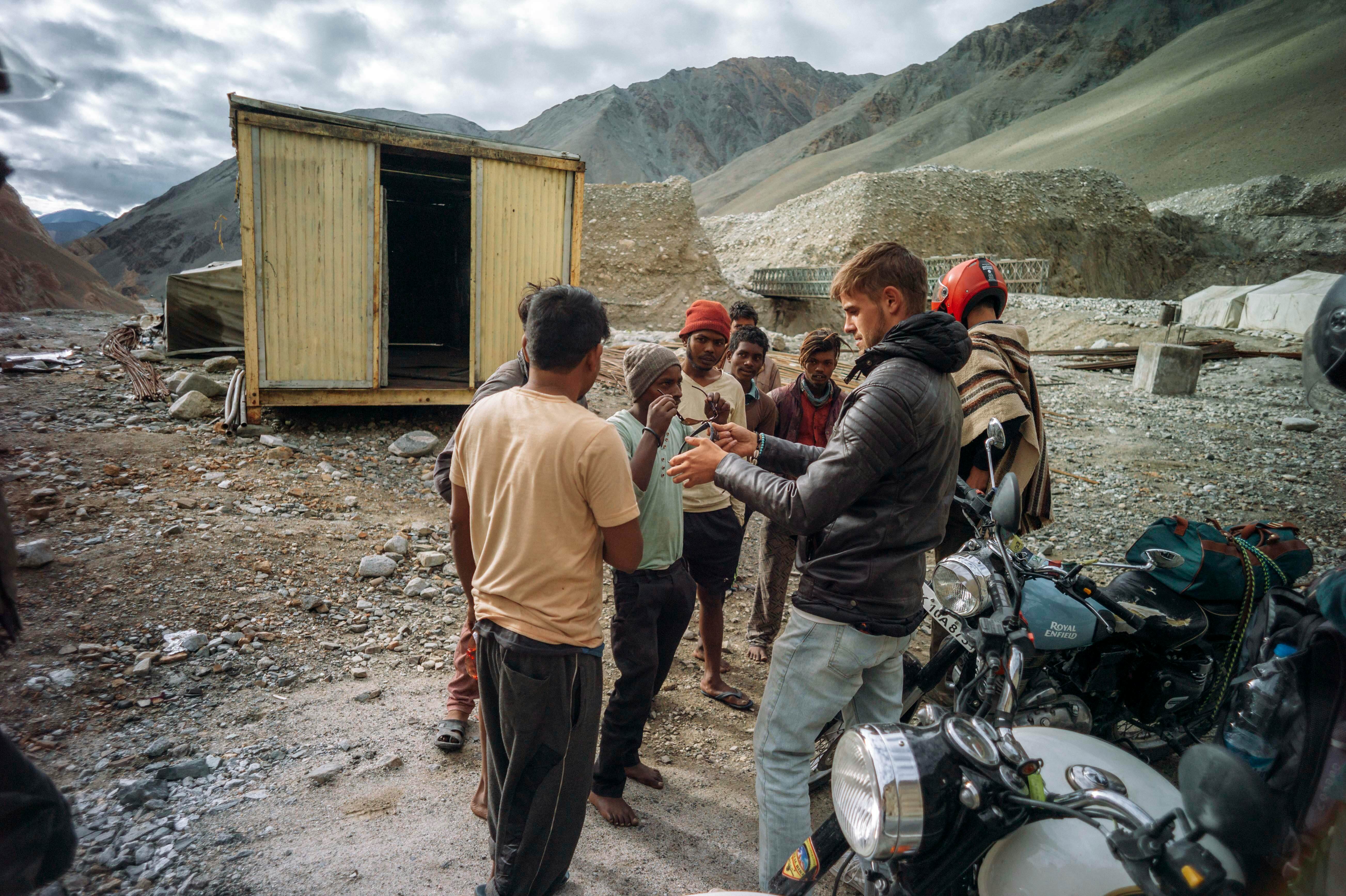 Co-Founder, Niklas Huppmann, gifting pairs of sunglasses on a Shades of Lovetrip