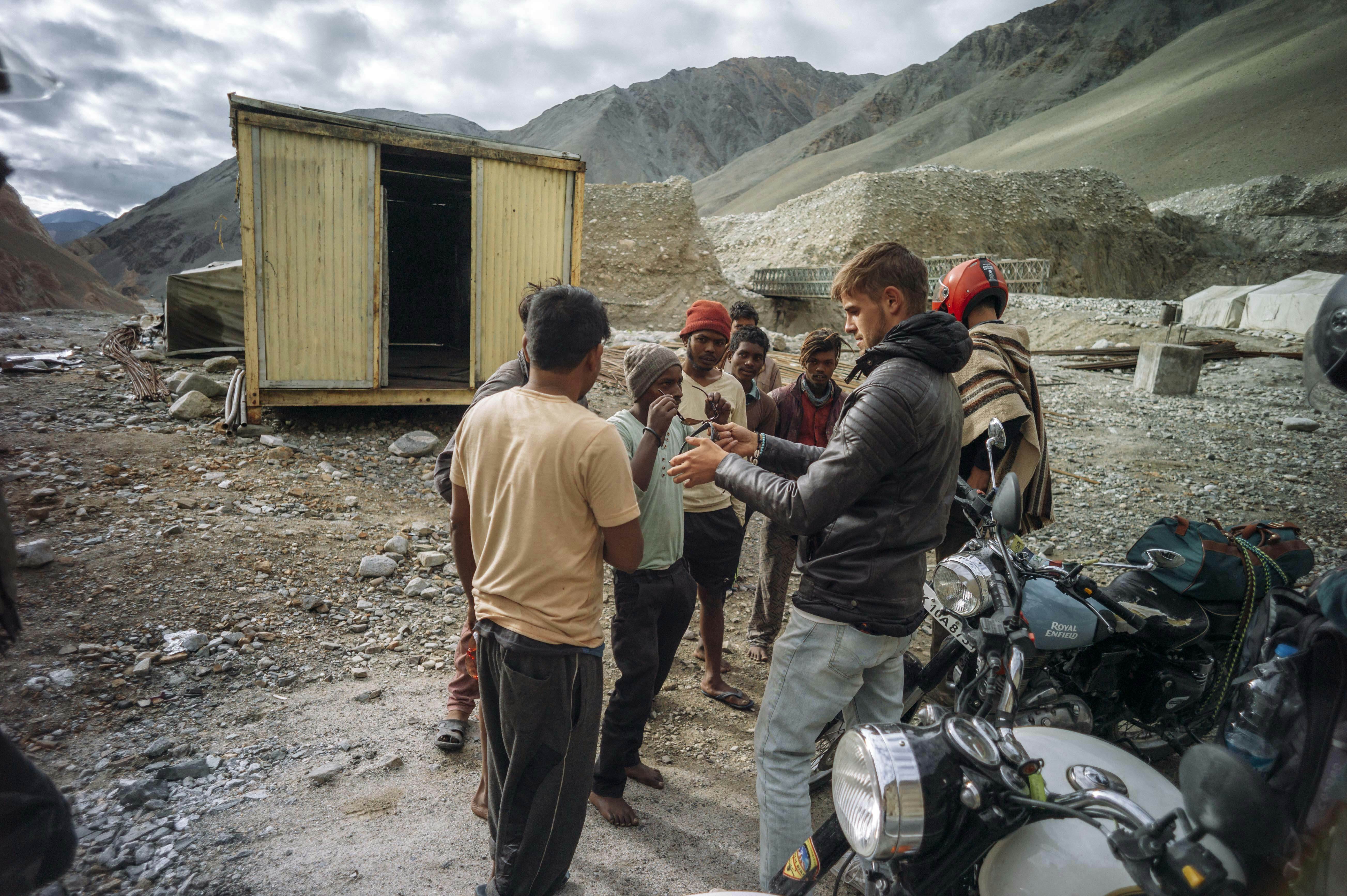 Co-Founder, Niklas Huppmann, gifting pairs of sunglasses on a Shades of Lovetrip