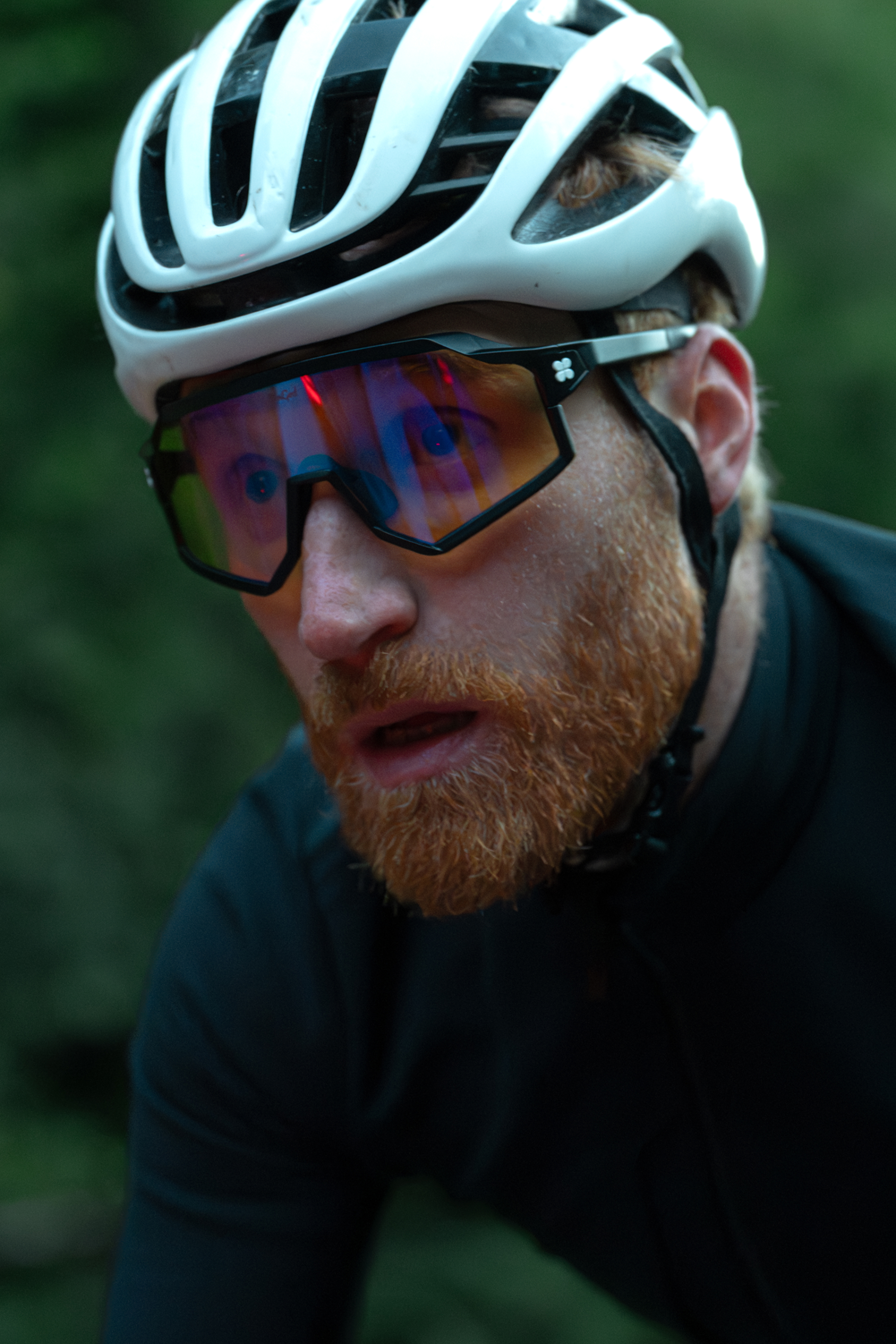 Alec wearing SunGod Black Velans with IRIS HV Blue Lenses