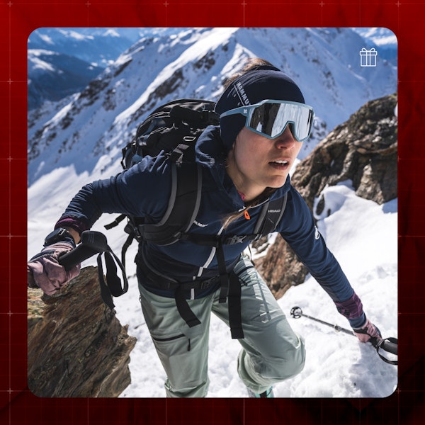 Woman wearing sunglasses on a mountain