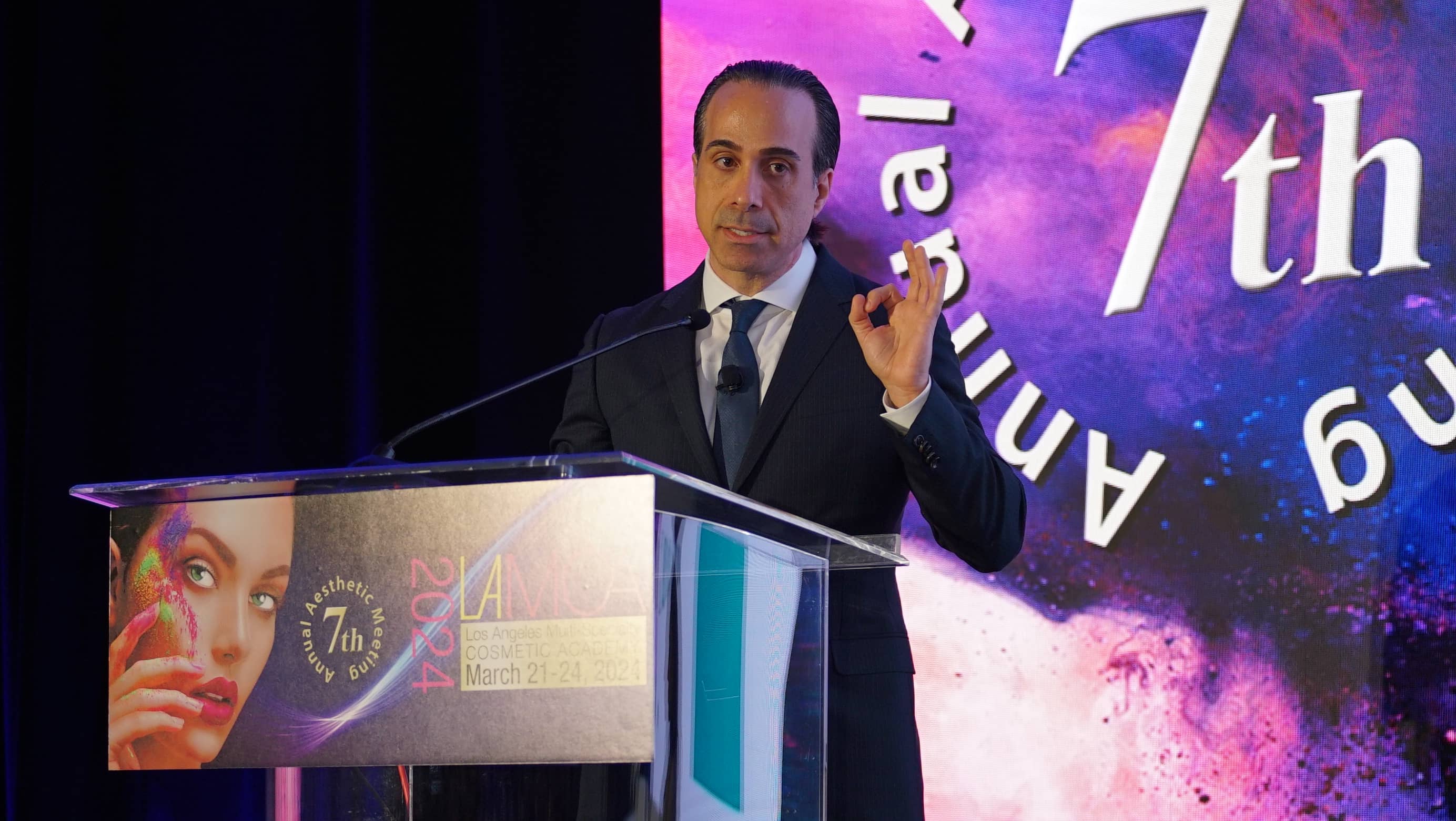A still from a video of Dr. Hovsepian lecturing about Sculptra BBL