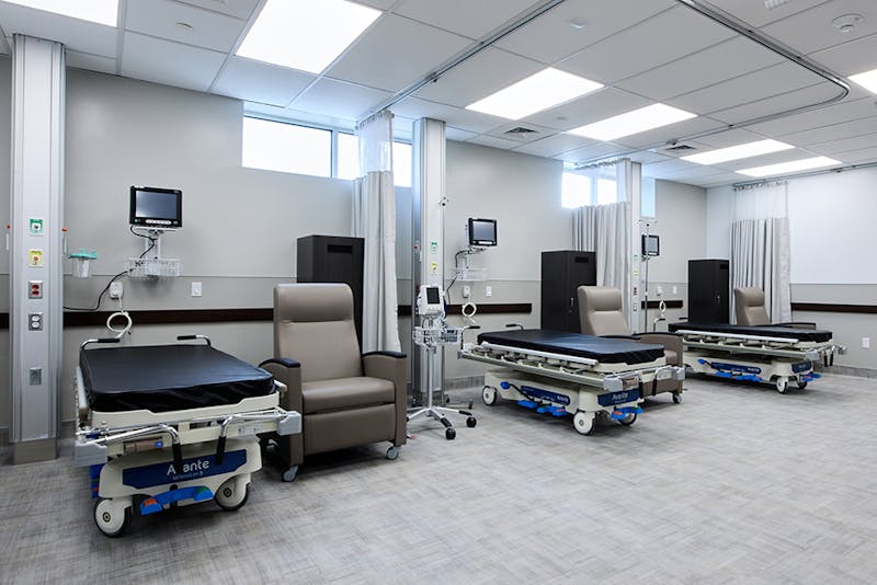 3 sets of patient tables and chairs