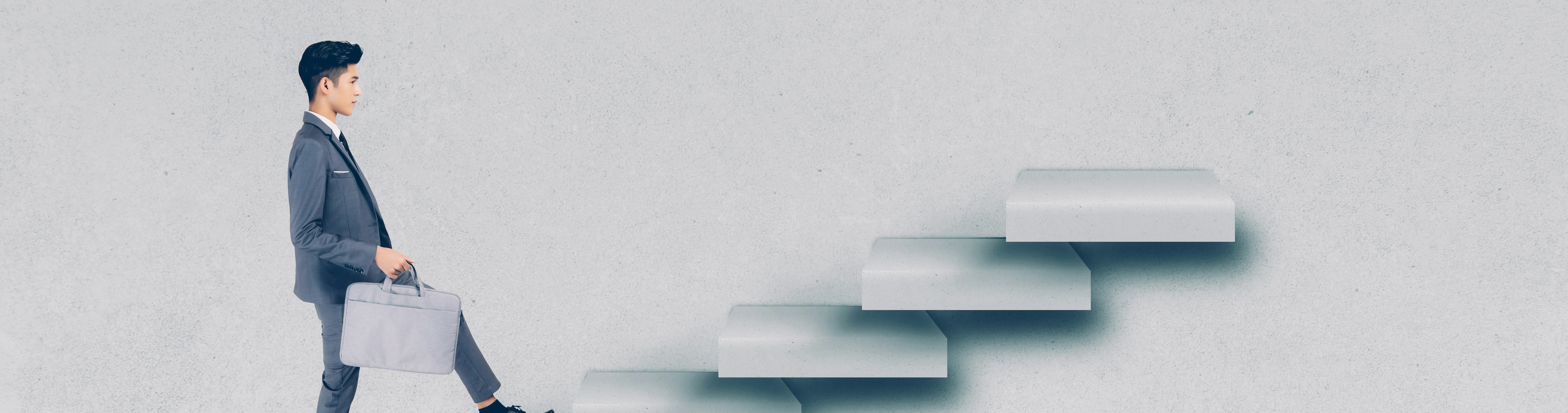 How iterative Product Discovery helps you solve the right problem blog post hero image, business man taking steps on stairs