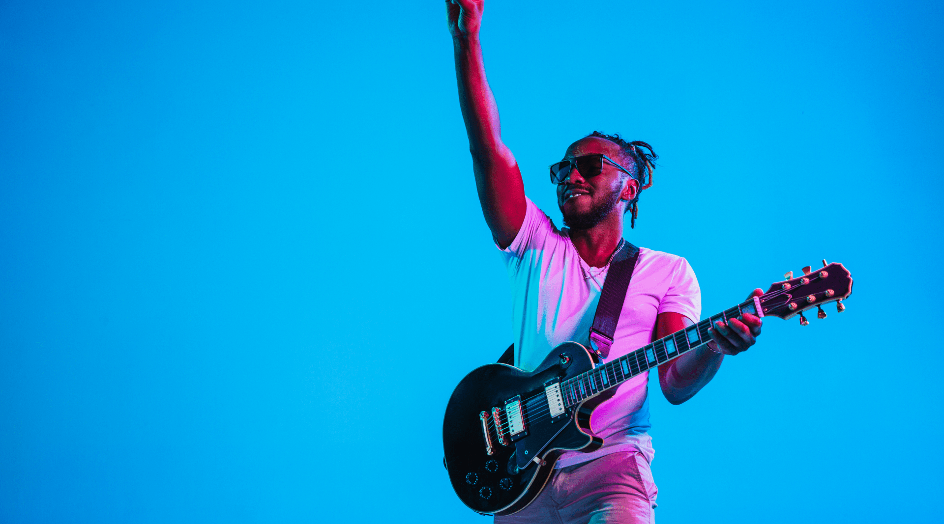 Rock star posing with guitar