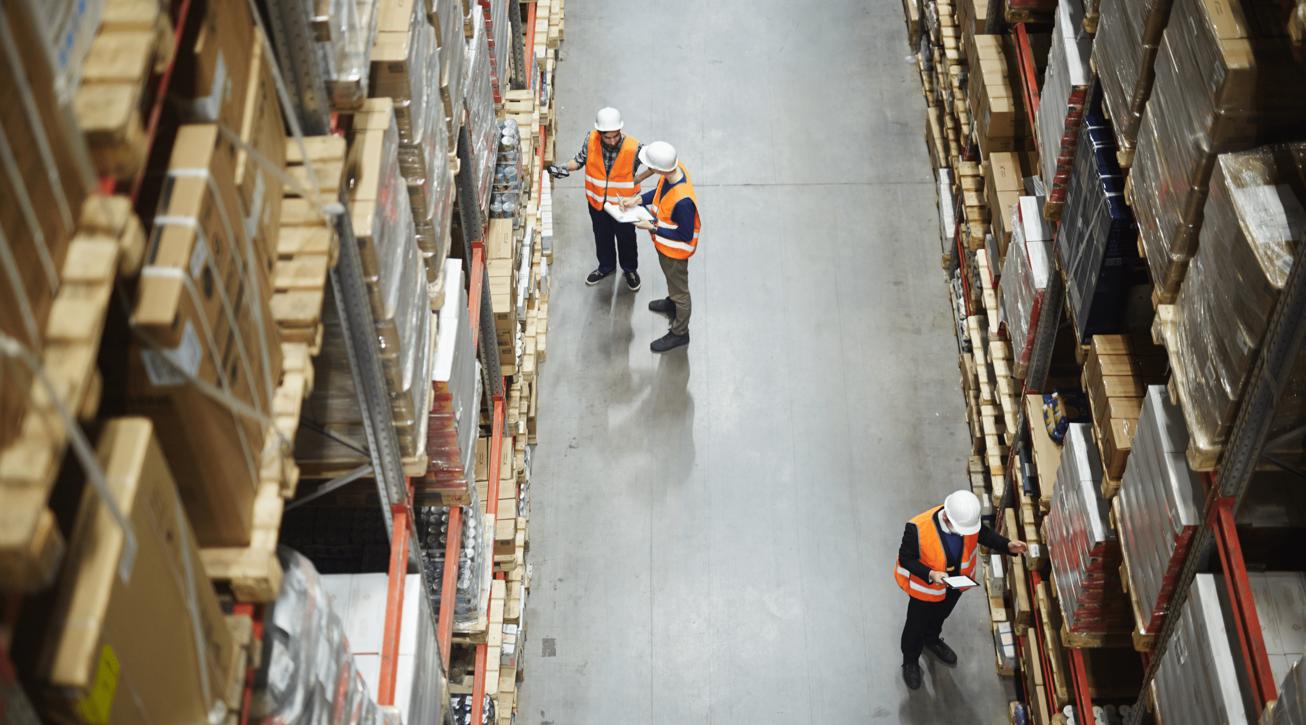 How we built an intelligent stock management system blog post hero image, workers in warehouse