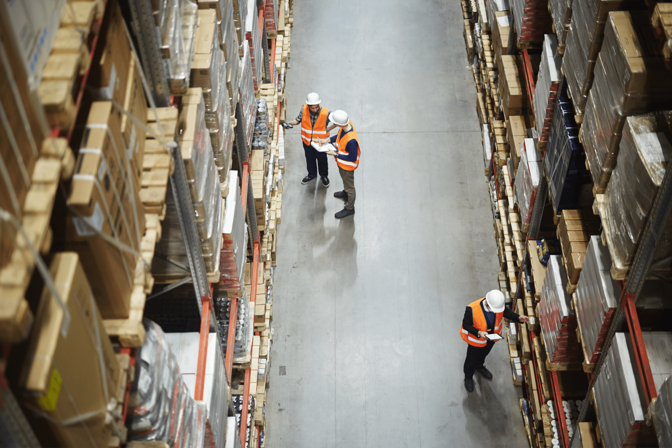 How we built an intelligent stock management system blog post hero image, workers in warehouse