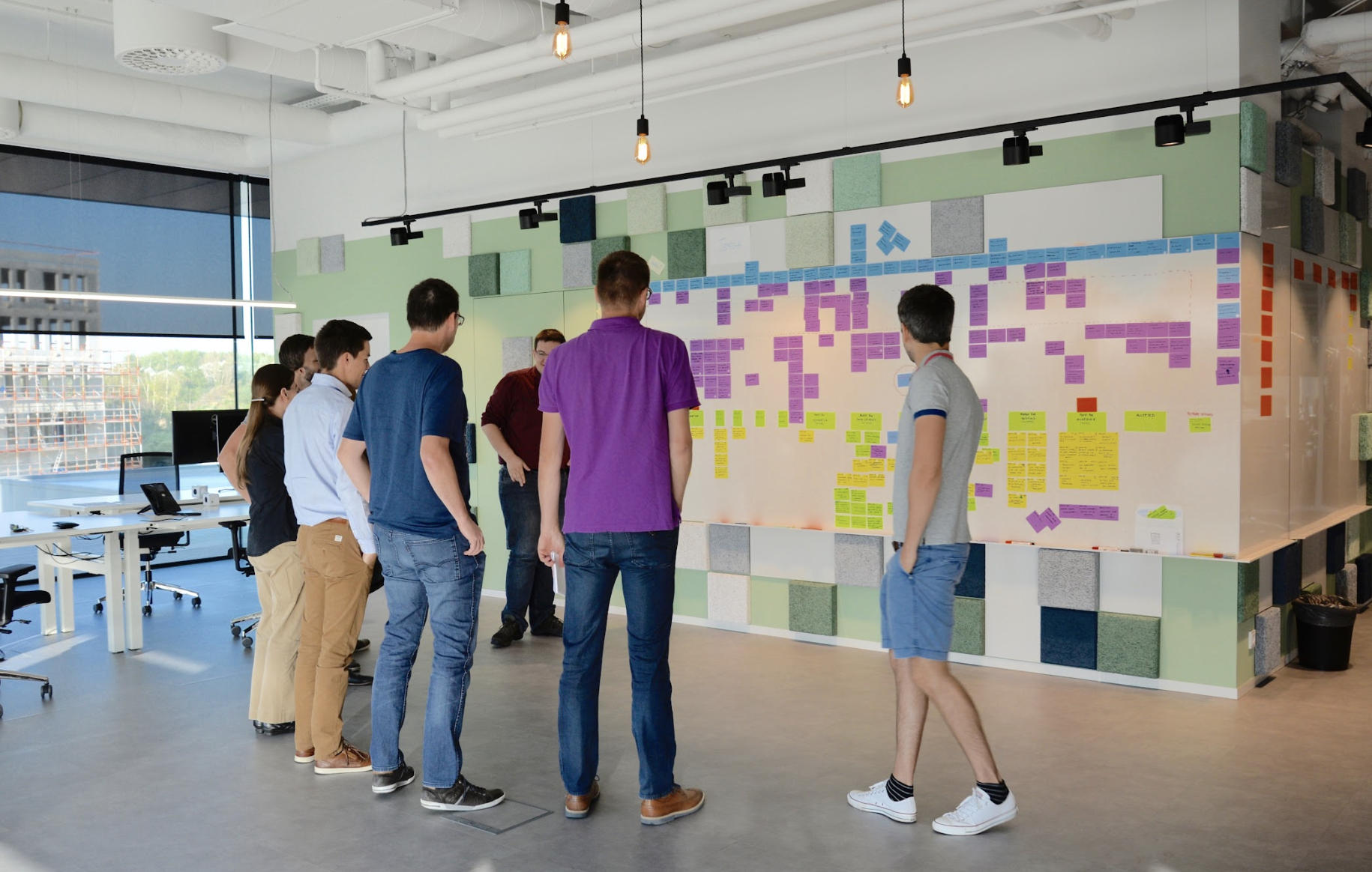 team having a scrum meeting