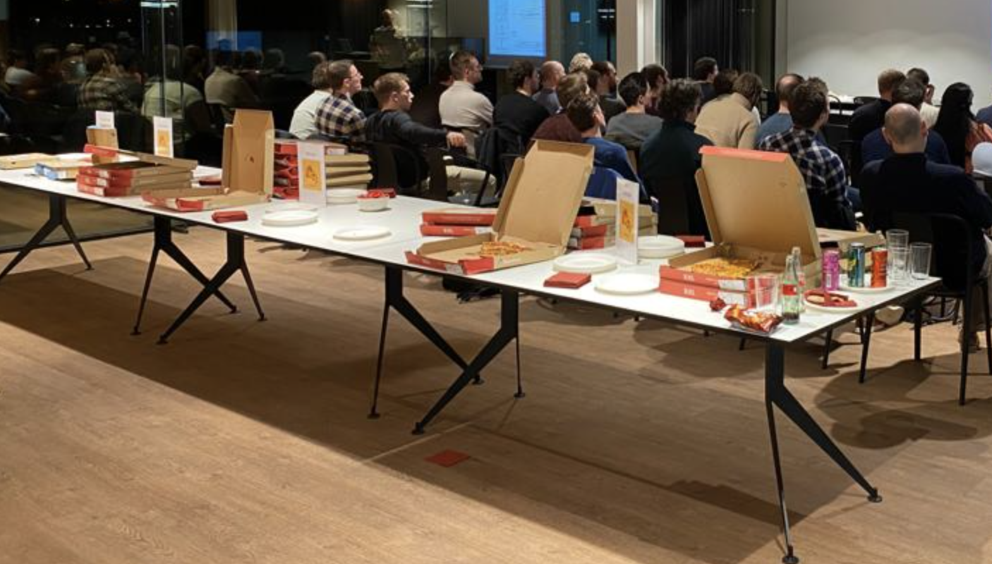 Table with pizza's in our office