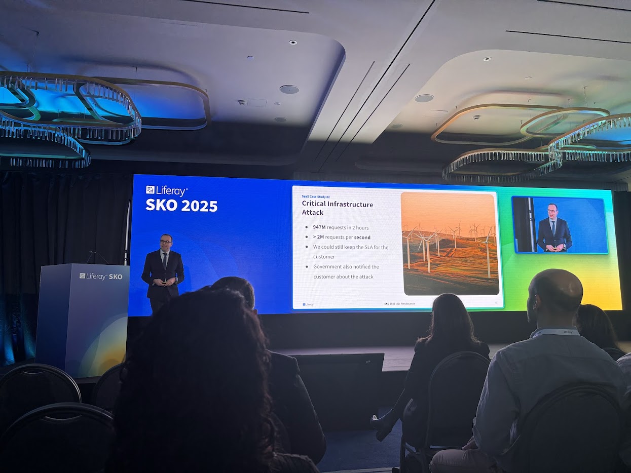 someone on the stage at Liferay SKO 2025