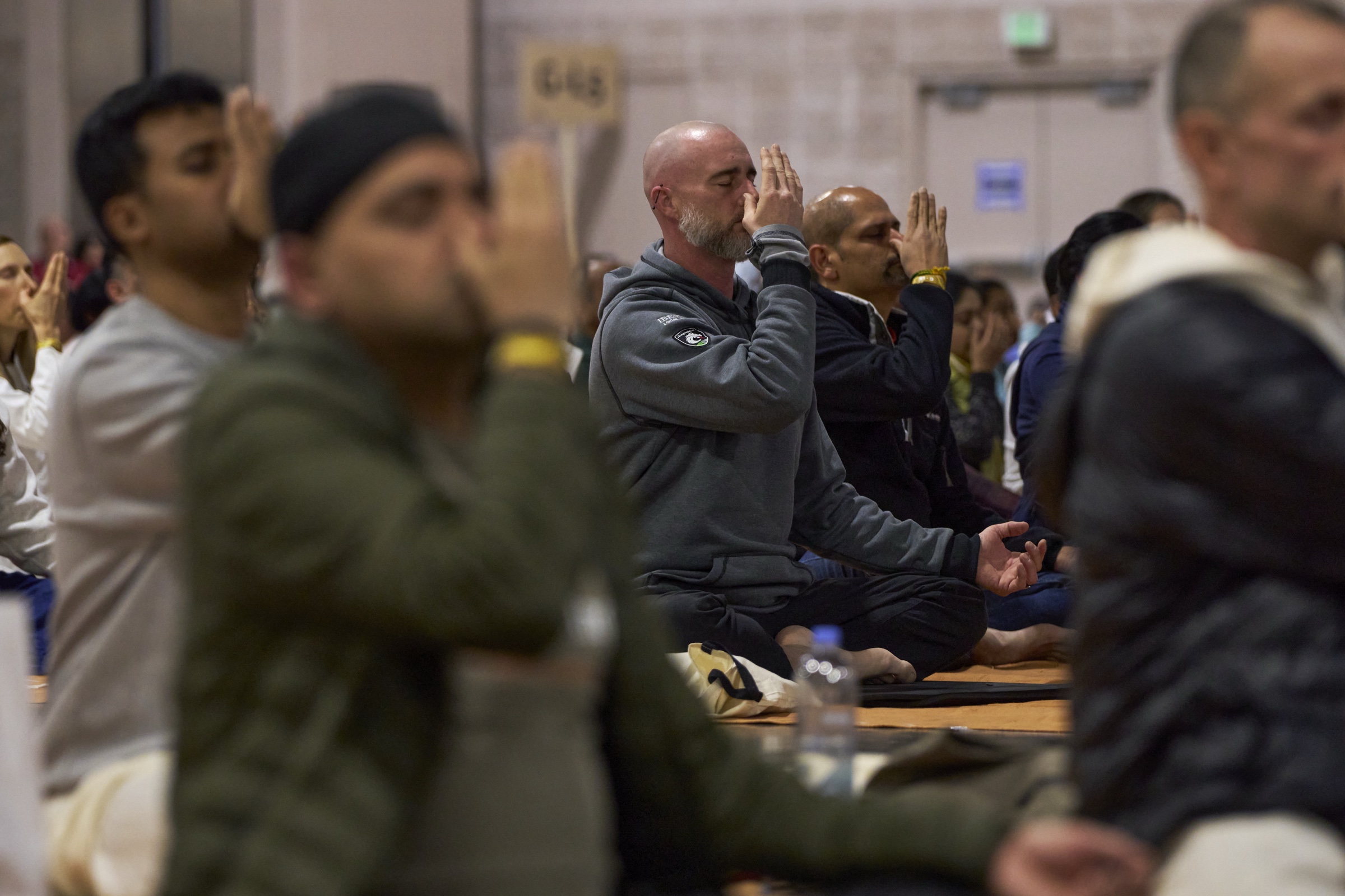 Practitioners at an Inner Engineering session