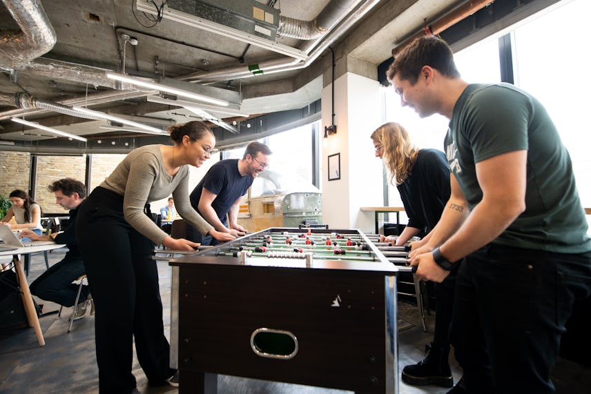 https://www.datocms-assets.com/46385/1631528099-rwe-team-enjoying-table-football-at-london-bridge-2-1.jpg?auto=format&fit=max&q=50&w=856