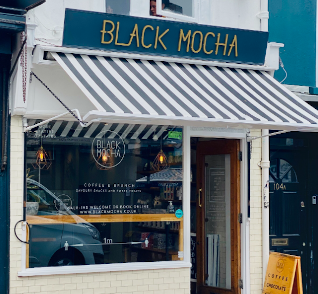 https://www.datocms-assets.com/46385/1675784915-black-mocha-brighton.png?auto=format&fit=max&q=50&w=636