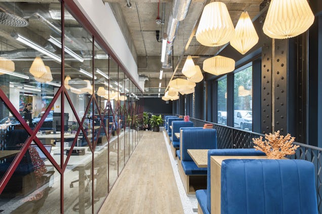 An image of Runway East Aldgate East breakout space and spacious private office, displaying lantern style lighting.