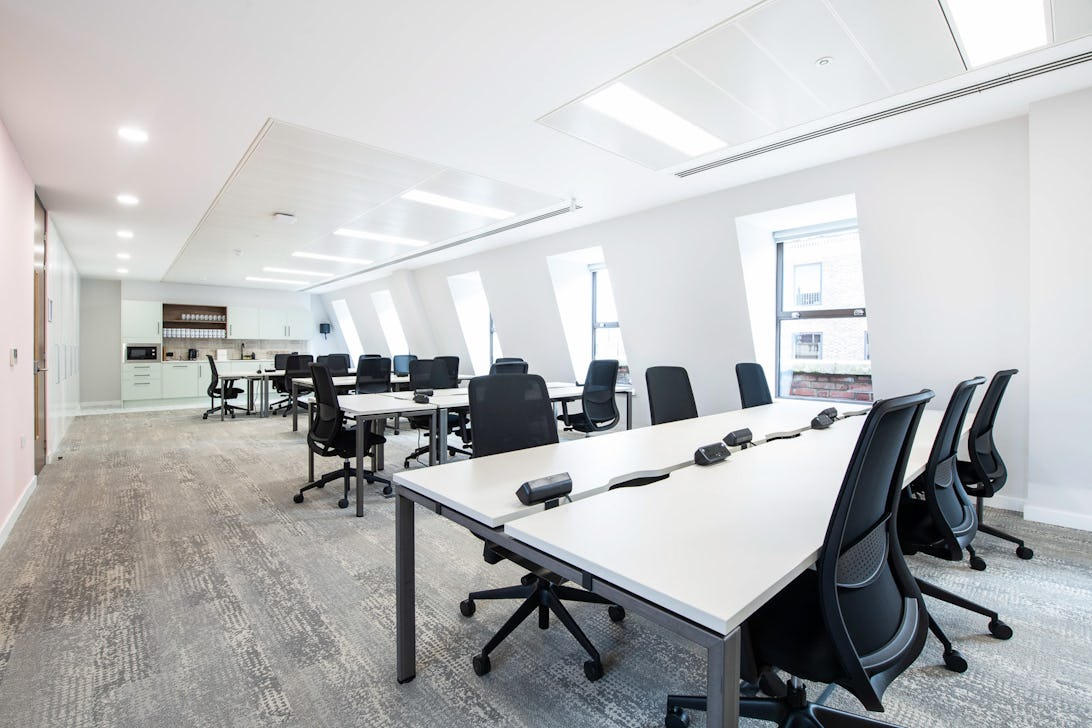 https://www.datocms-assets.com/46385/1699987190-29-desk-self-contained-suite.jpg?auto=format&fit=max&q=50&w=1092