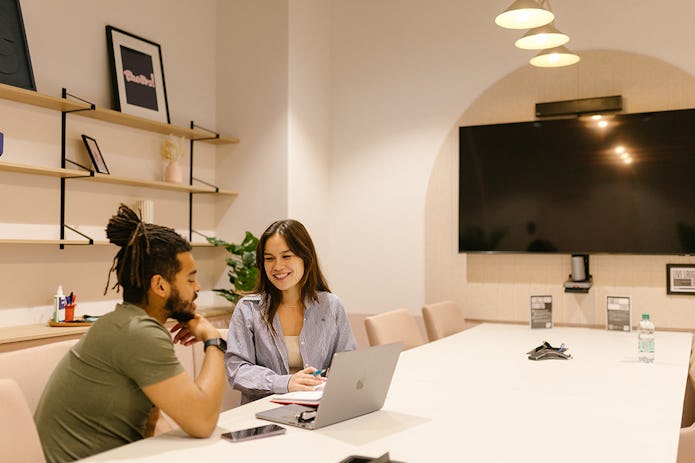 Two people in a meeting room at Runway East Birmingham