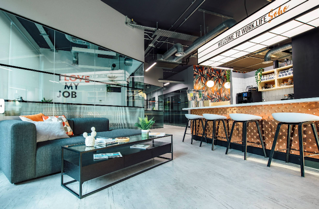 An image of a breakout space and cafe at Work.Life