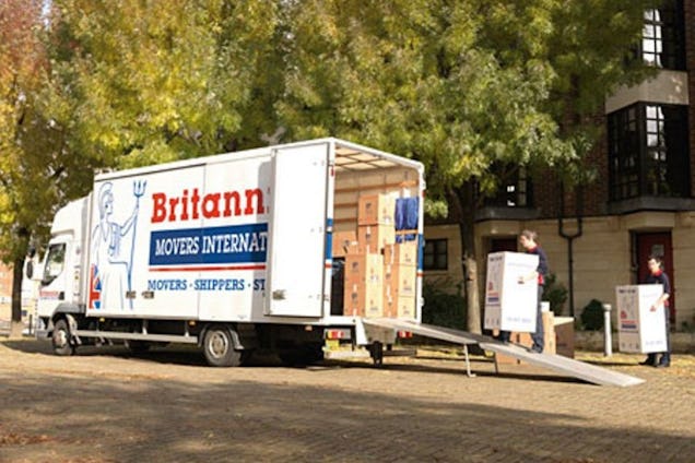 Britannia Lanes of Bristol Workers Moving Boxes into the Van