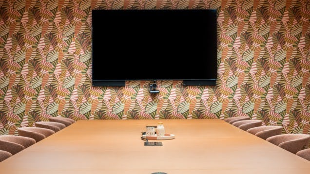 https://www.datocms-assets.com/46385/1749644009-meeting-room.jpg?auto=format&fit=max&q=50&w=636