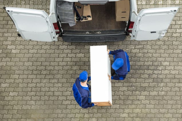 JH Removals staff loading the van