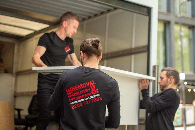 The Removal & Delivery Company Staff Loading Van