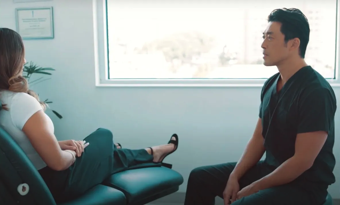 image of Dr. Ching with a patient