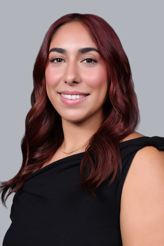Madeleine Banuelos, Receptionist
