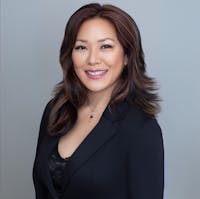 Woman standing in black outfit