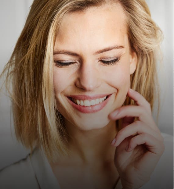 woman with blonde hair smiling