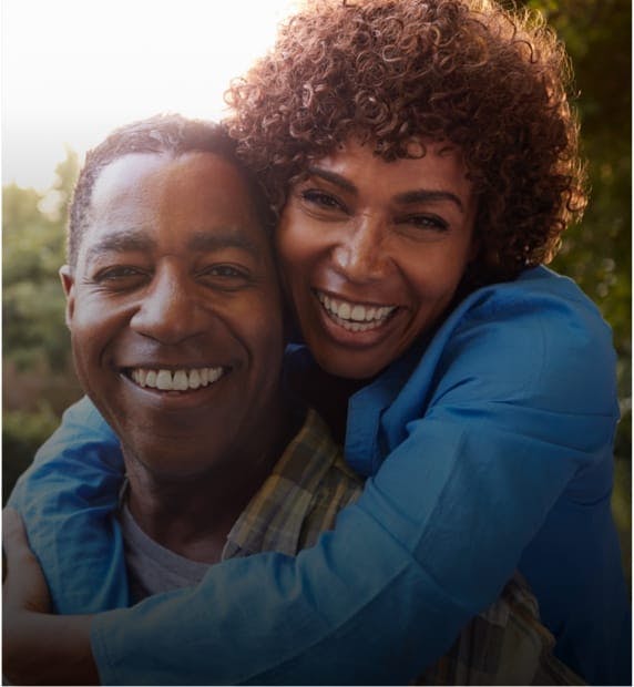 couple embracing and smiling