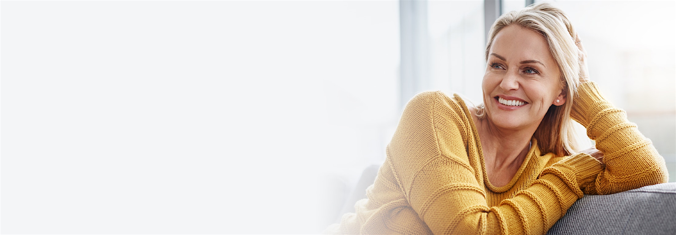 woman in a yellow sweater