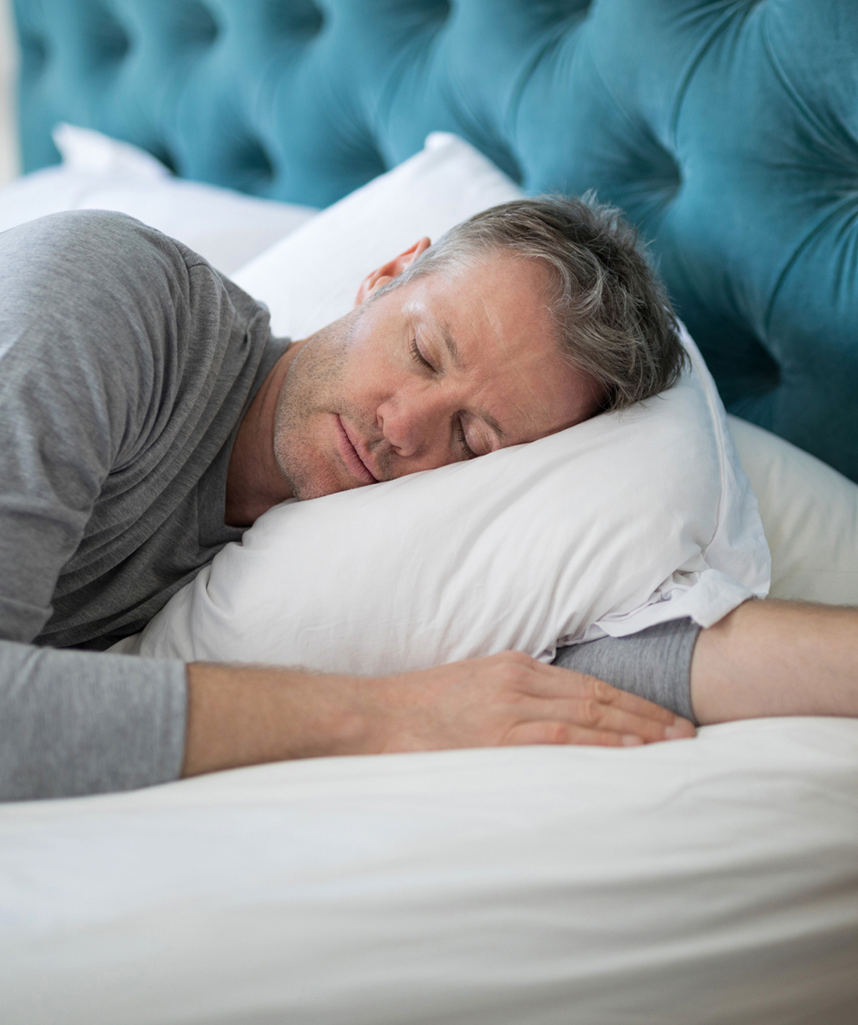 Man sleeping in bed
