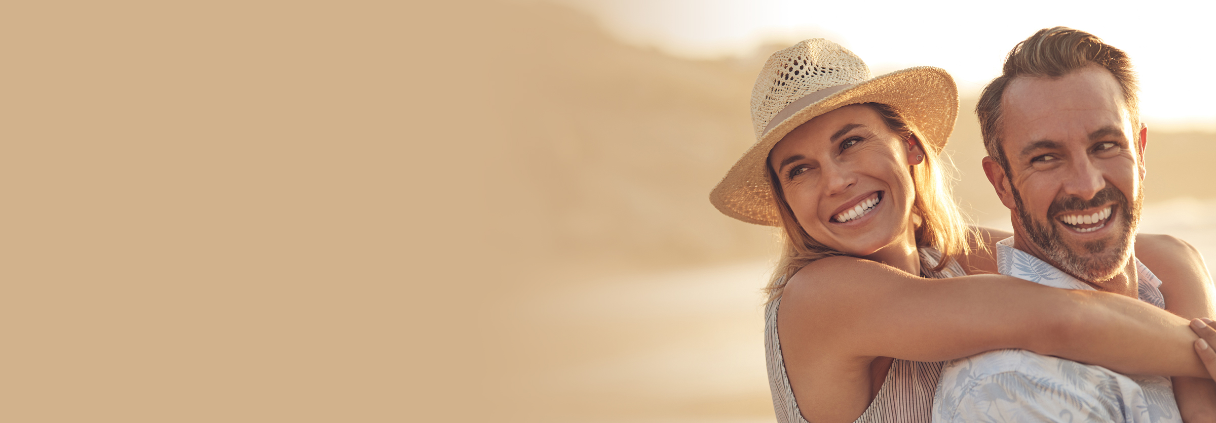 couple smiling while embracing