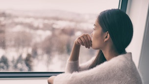 woman-looking-out-window