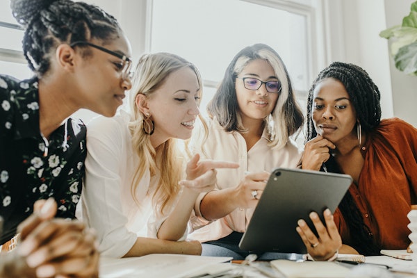 a-group-of-women-with-tablet